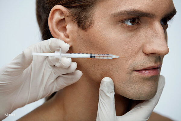 Man getting a facial injection